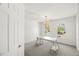 Bedroom featuring two windows providing ample natural light and a table ready for work or hobbies at 817 Highwater Pl, Fuquay Varina, NC 27526