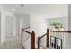 Bright foyer with staircase and chandelier, offering a grand welcome with plenty of natural light at 817 Highwater Pl, Fuquay Varina, NC 27526