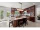 Gourmet kitchen featuring large island, stainless appliances, and ample cabinet space at 817 Highwater Pl, Fuquay Varina, NC 27526
