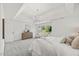 Bright main bedroom features neutral colors, a chandelier, and an abundance of natural light at 817 Highwater Pl, Fuquay Varina, NC 27526