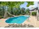 Inviting backyard pool with slide and landscaped surroundings at 817 Highwater Pl, Fuquay Varina, NC 27526