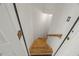 A view of a simple wooden staircase connecting different levels of the home at 817 Highwater Pl, Fuquay Varina, NC 27526