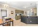 Bright kitchen features granite countertops, tiled floors, and modern appliances at 8600 Clivedon Dr, Raleigh, NC 27615