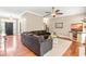 Comfortable living room offers plenty of seating, wood floors and natural light at 8600 Clivedon Dr, Raleigh, NC 27615