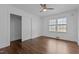 Bedroom with hardwood floors, closet and a ceiling fan at 900 Roxboro Road, Oxford, NC 27565