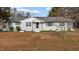 A home with a well manicured front yard and a walkway at 900 Roxboro Road, Oxford, NC 27565