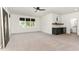 Finished basement with carpet, bar area and three windows at 904 Harrison Ridge Rd, Wake Forest, NC 27587