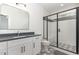 Modern bathroom with subway tile and patterned tile shower and floor at 904 Harrison Ridge Rd, Wake Forest, NC 27587