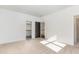 Neutral carpeted bedroom with closet and doorway to the rest of the home at 904 Harrison Ridge Rd, Wake Forest, NC 27587