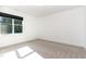 Bright bedroom with a large window and neutral carpeting at 904 Harrison Ridge Rd, Wake Forest, NC 27587