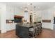 Spacious kitchen with center island seating, pendant lighting and stainless steel appliances at 904 Harrison Ridge Rd, Wake Forest, NC 27587