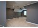 Spacious bedroom featuring neutral carpet, an overhead fan, and a window at 945 Jones Wynd, Wake Forest, NC 27587