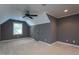 Large bedroom featuring neutral carpet, an overhead fan, and a window at 945 Jones Wynd, Wake Forest, NC 27587