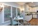 Inviting breakfast nook with a view to the kitchen and backyard at 945 Jones Wynd, Wake Forest, NC 27587