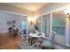 Cozy breakfast nook with windows, and view to the living room at 945 Jones Wynd, Wake Forest, NC 27587