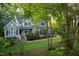 Beautiful two-story home with meticulously manicured front yard and professional landscaping enhancing the curb appeal at 945 Jones Wynd, Wake Forest, NC 27587