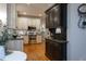 Bright kitchen featuring stainless steel appliances, tiled backsplash and hardwood floors at 945 Jones Wynd, Wake Forest, NC 27587