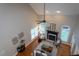 Living room features hardwood floors, fireplace, and natural light at 945 Jones Wynd, Wake Forest, NC 27587