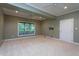 Spacious living room with recessed lighting and natural light from the window at 945 Jones Wynd, Wake Forest, NC 27587