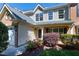 Attractive exterior showcasing well-manicured landscaping, complemented by classic architecture and a welcoming front entrance at 9508 Vira Dr, Raleigh, NC 27617