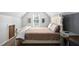 Bedroom featuring neutral color palette with a large window and two mirrors accentuating the natural light at 1006 Trumpet Vine Ct, Wendell, NC 27591