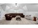 Spacious bonus room with comfortable seating, fan, and carpet at 1006 Trumpet Vine Ct, Wendell, NC 27591