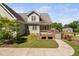Rear exterior of the house showing a fenced backyard and patio at 1006 Trumpet Vine Ct, Wendell, NC 27591