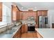 Well-equipped kitchen with stainless steel appliances and ample countertop space at 1006 Trumpet Vine Ct, Wendell, NC 27591