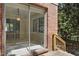 Enclosed patio with brick exterior and large sliding glass doors at 101 Atchison St, Garner, NC 27529