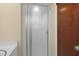 Walk in shower with frosted glass door, and neutral walls at 101 Atchison St, Garner, NC 27529