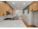 Bright kitchen with stainless steel appliances, modern cabinets, and quartz countertops at 1013 Forrestal Pl, Durham, NC 27707