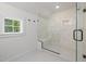 Bright bathroom featuring a glass walk-in shower with seat at 1013 Forrestal Pl, Durham, NC 27707
