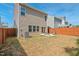 A spacious backyard features a privacy fence, patio, and grilling area, offering a blend of relaxation and outdoor entertaining at 1021 Sweet Cream Ct, Durham, NC 27703