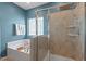 Luxurious bathroom featuring separate shower and soaking tub at 1021 Sweet Cream Ct, Durham, NC 27703
