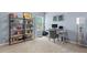 Bright bedroom featuring a large window, desk, shelves and stylish decor at 1021 Sweet Cream Ct, Durham, NC 27703