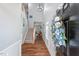 Inviting foyer with hardwood floors, a staircase, and a stylish entry door at 1021 Sweet Cream Ct, Durham, NC 27703