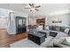 Spacious living area with view of stairs, kitchen, and dining area with stylish decor at 1021 Sweet Cream Ct, Durham, NC 27703