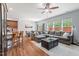 Open concept living space connects kitchen, dining area, and living room with hardwood floors at 1021 Sweet Cream Ct, Durham, NC 27703