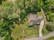 Aerial view featuring a roof, spacious lot and manicured landscaping at 1037 Lila Ln, Raleigh, NC 27614