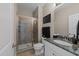 Well-appointed bathroom featuring a granite countertop, tiled shower, and contemporary finishes at 1037 Lila Ln, Raleigh, NC 27614