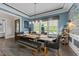 Dining room featuring stylish decor, comfortable seating, and a warm, inviting ambiance at 1037 Lila Ln, Raleigh, NC 27614