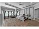 Serene main bedroom featuring a decorative accent wall, and bright natural light at 1037 Lila Ln, Raleigh, NC 27614