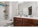 Bathroom with double sink vanity and tub/shower combination at 1041 Cotulla Dr, Morrisville, NC 27560