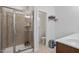 Bathroom featuring a glass-door shower at 1041 Cotulla Dr, Morrisville, NC 27560