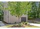 Exterior of home with front yard featuring mature tree, fresh grass, and landscaping at 1041 Cotulla Dr, Morrisville, NC 27560