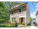 Charming home featuring neutral siding, complementary shutters, and manicured landscaping on a green lawn at 1041 Cotulla Dr, Morrisville, NC 27560