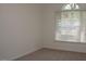 Bedroom with large windows at 10461 Dapping Dr, Raleigh, NC 27614