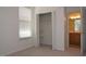 Bedroom featuring a closet and a glimpse into an en-suite bathroom at 10461 Dapping Dr, Raleigh, NC 27614