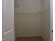 Walk-in closet with wire shelving at 10461 Dapping Dr, Raleigh, NC 27614