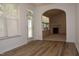 Sunroom that opens to a living room with a fireplace at 10461 Dapping Dr, Raleigh, NC 27614